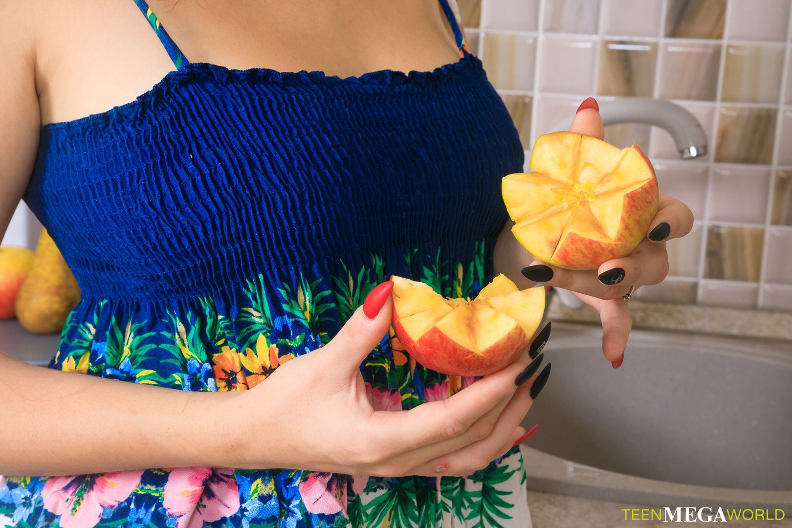 Brunette satisfies hunger with a dildo